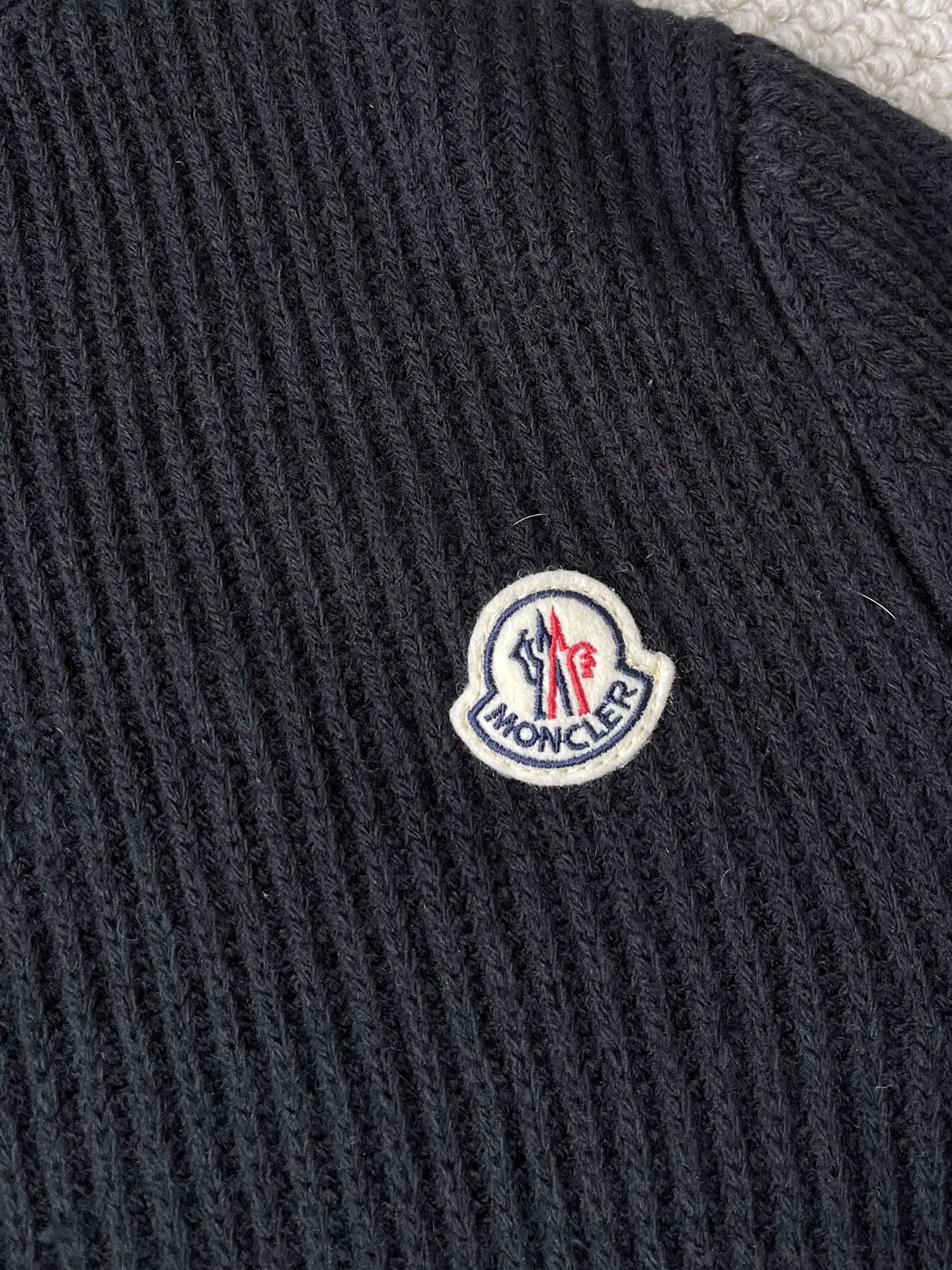 Ribbed Badge Quarter-Zip Sweater — product photograph