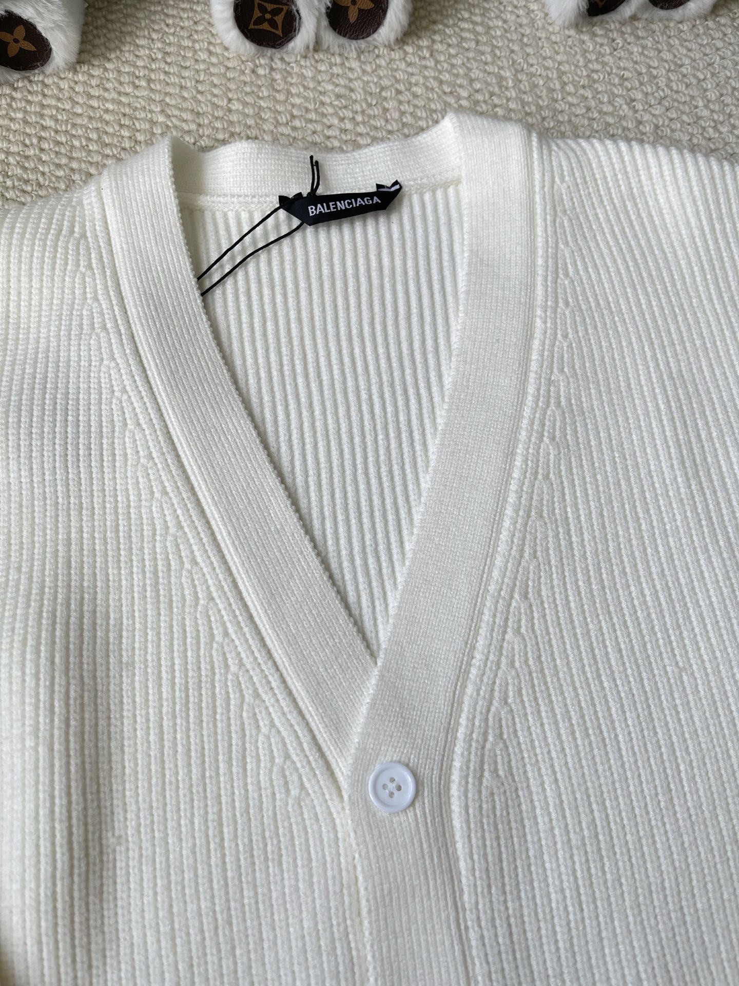 Sleeve-Label Ribbed Cardigan — product photograph