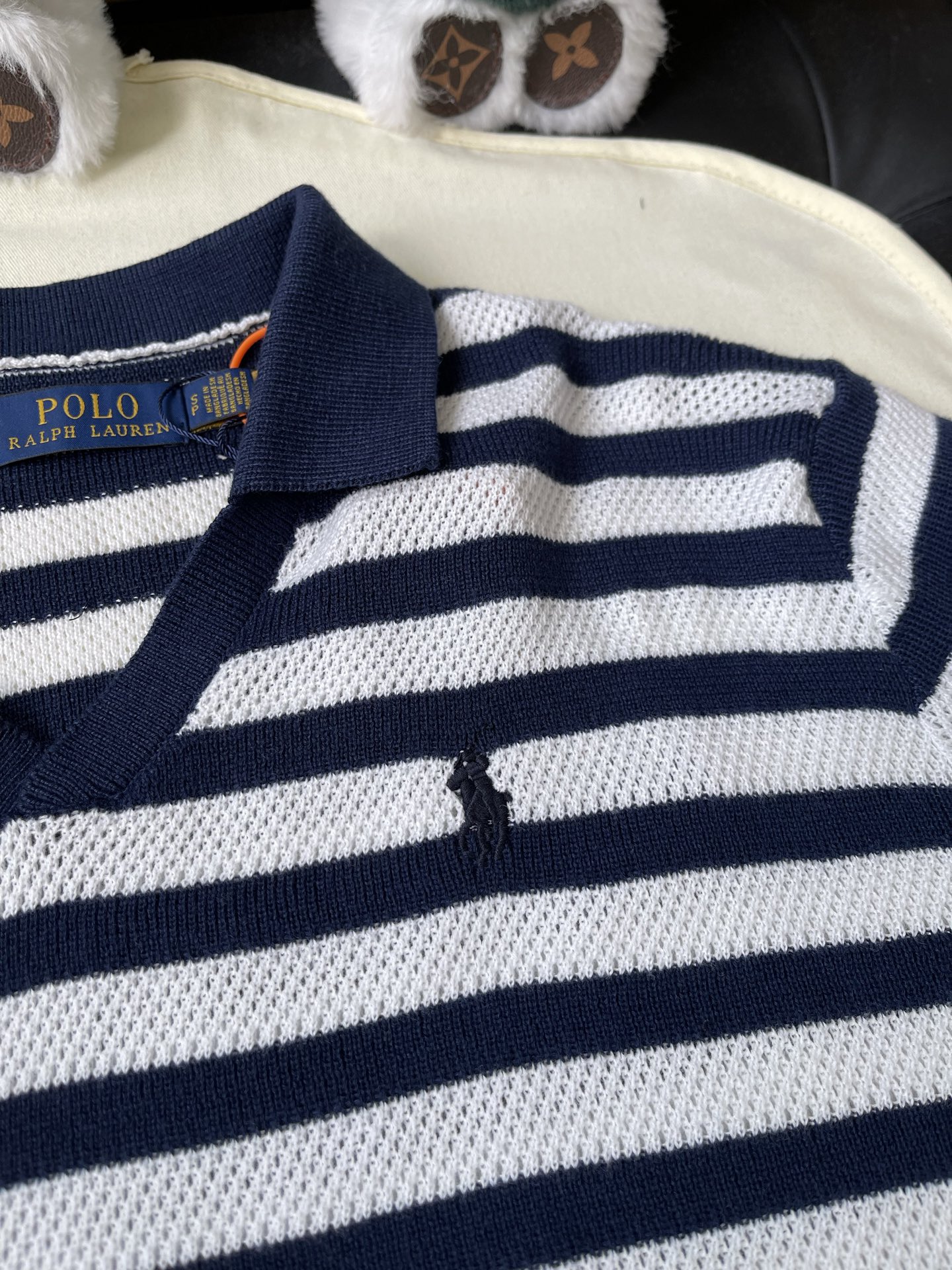 Striped Open-Neck Knit Polo — product photograph