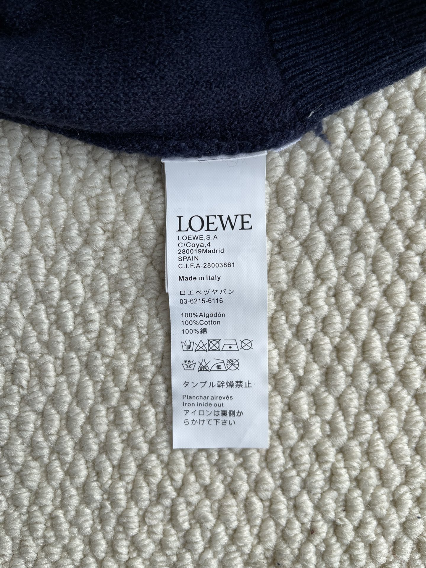 Textured Anagram Zip-Up Hoodie — product photograph