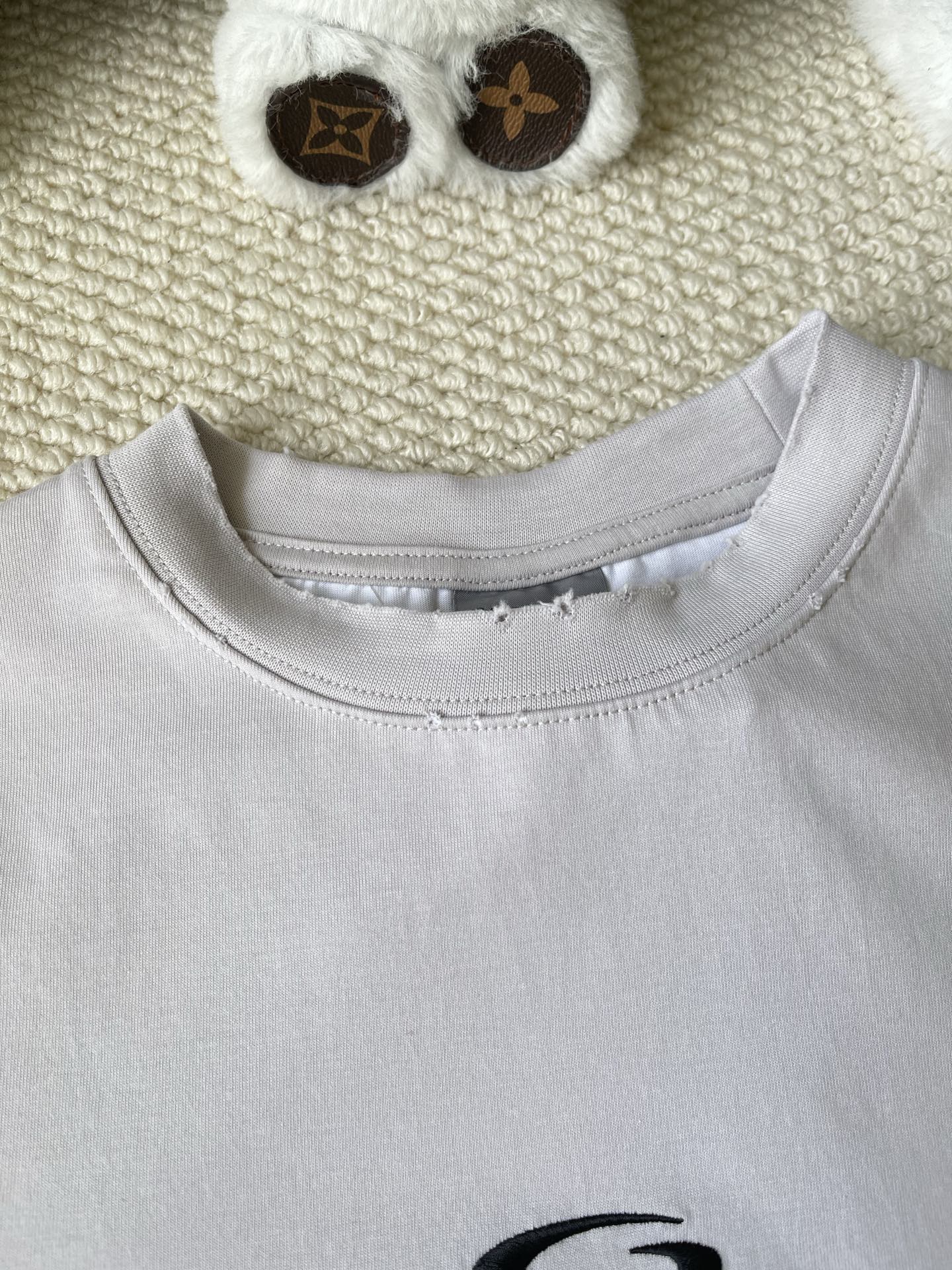 Spiked-Letter Sleeve Top — product photograph