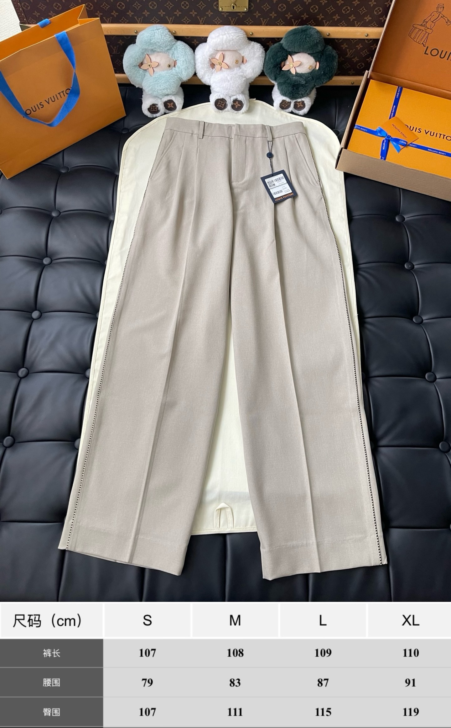 Pleated Wide-Leg Trousers — product photograph