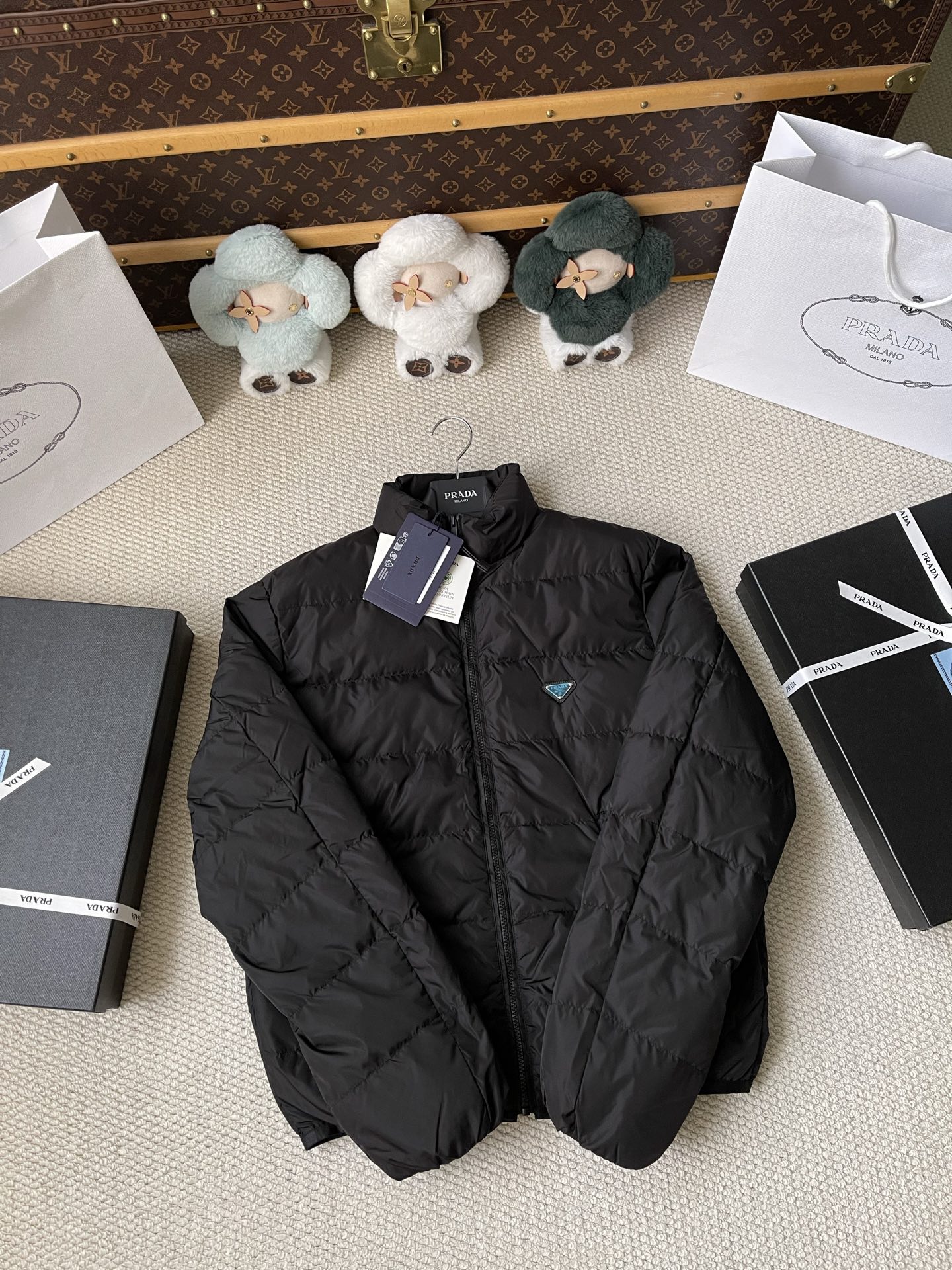 Triangle-Badge Zip-Pocket Puffer — product photograph