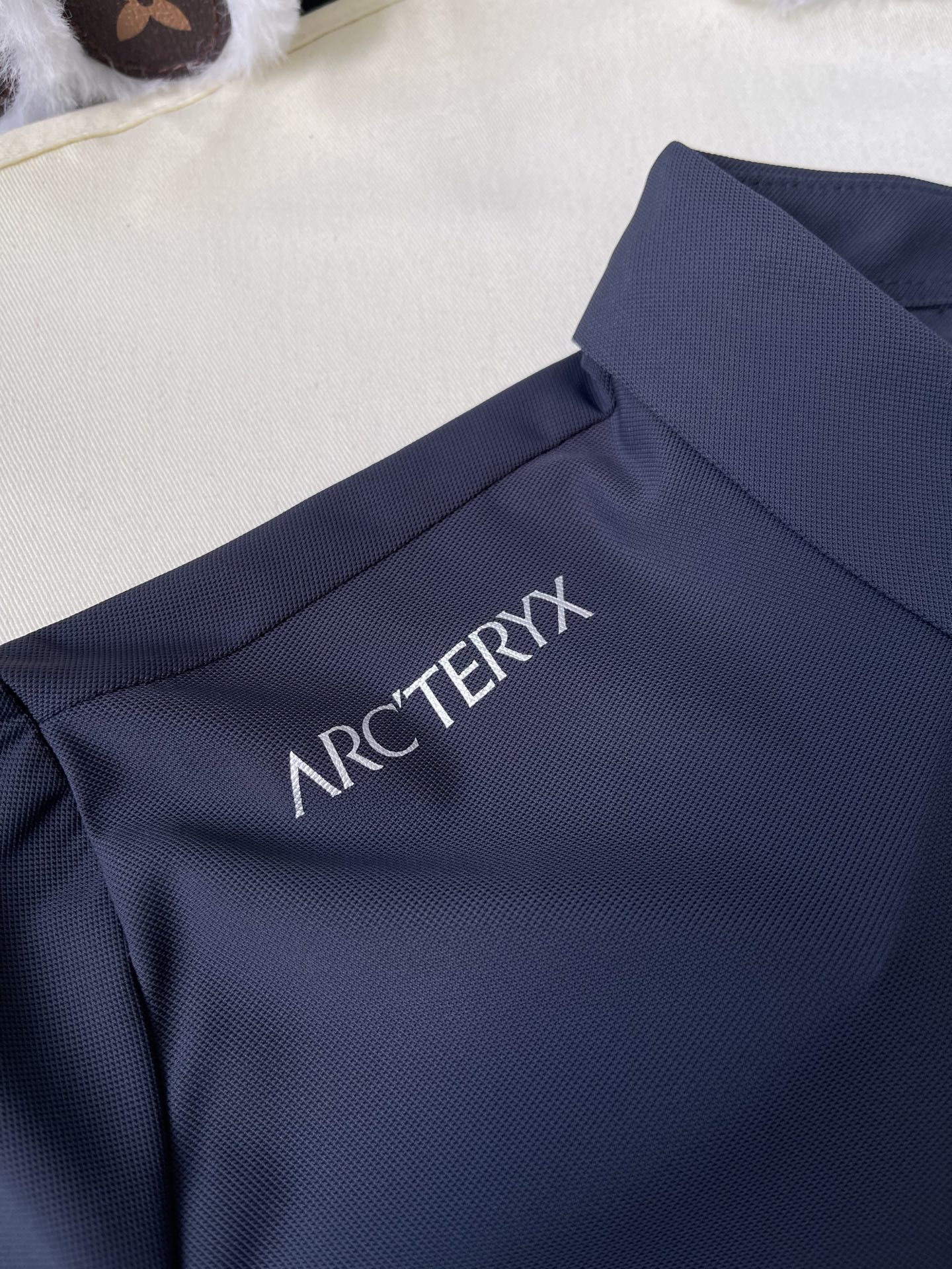 Bird-Emblem Short-Sleeve Polo — product photograph