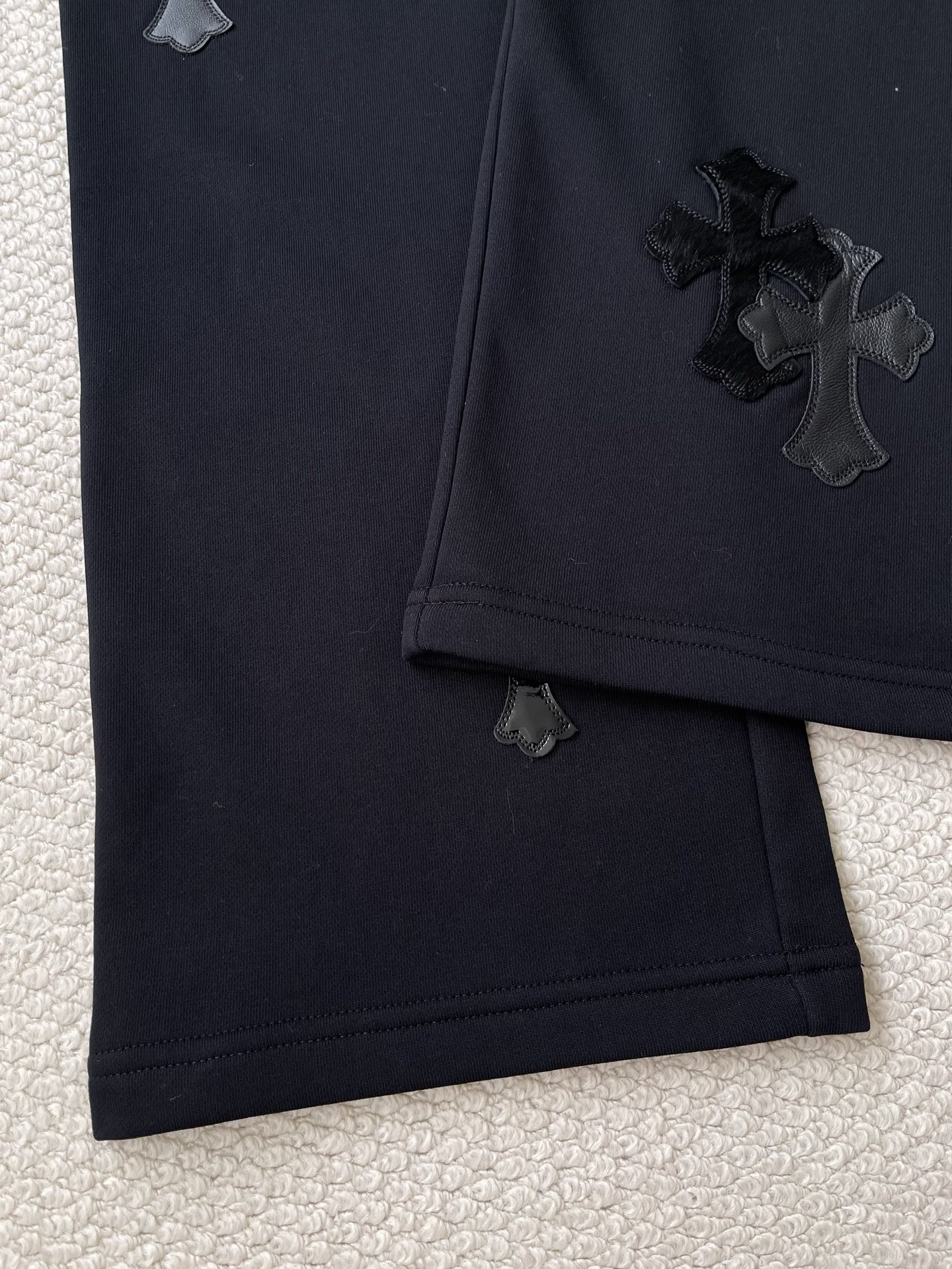 Cross-Motif Drawstring Trousers — product photograph