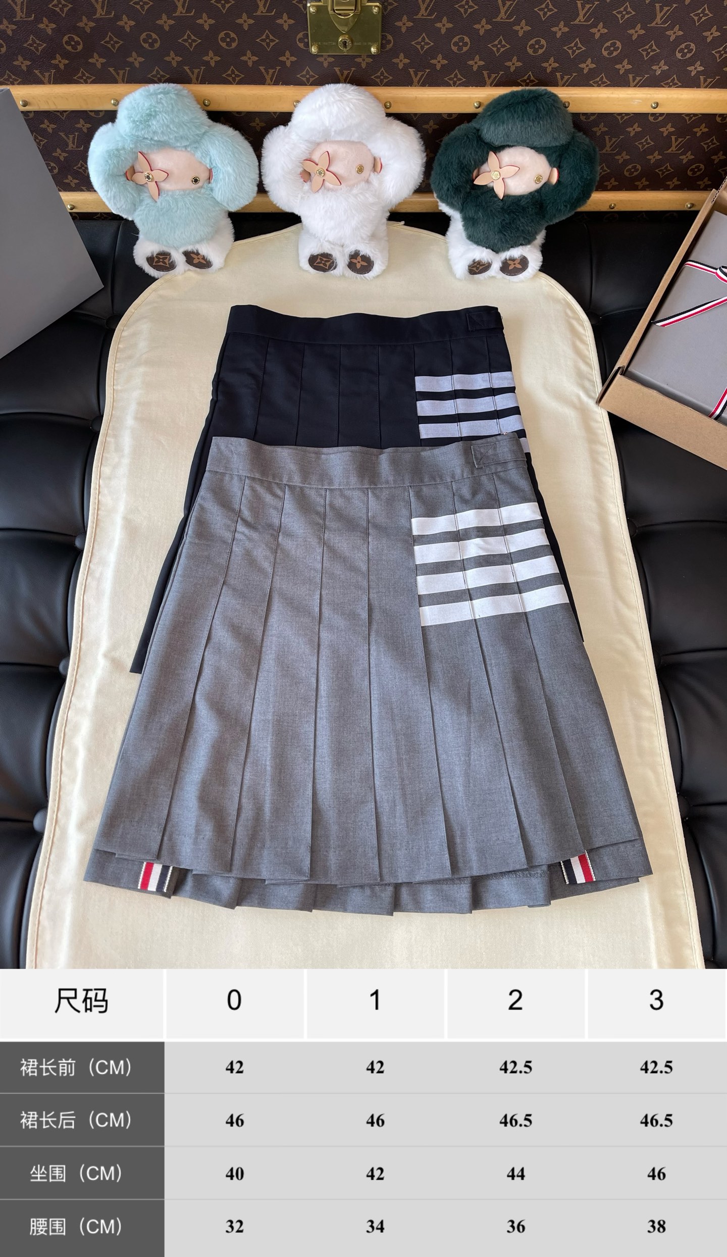 Four-Bar Layered Pleated Skirt — product photograph