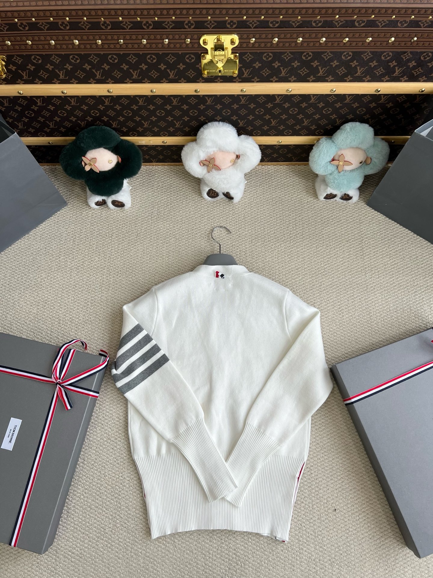 Four-Bar V-Neck Cardigan with Button Cuffs — product photograph