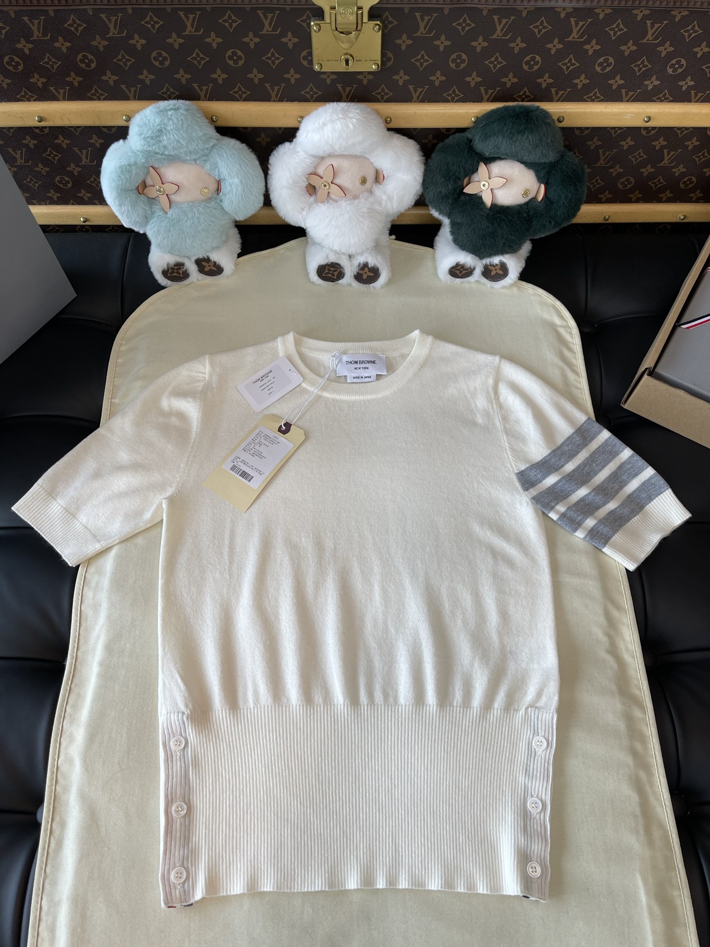 Four-Bar Sleeve Crewneck Knit Top — product photograph