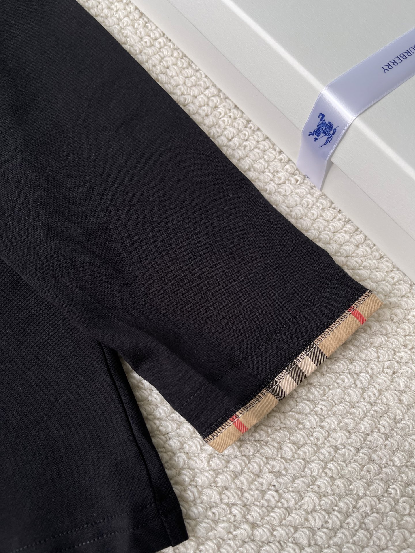 Check-Cuff Long-Sleeve Top — product photograph