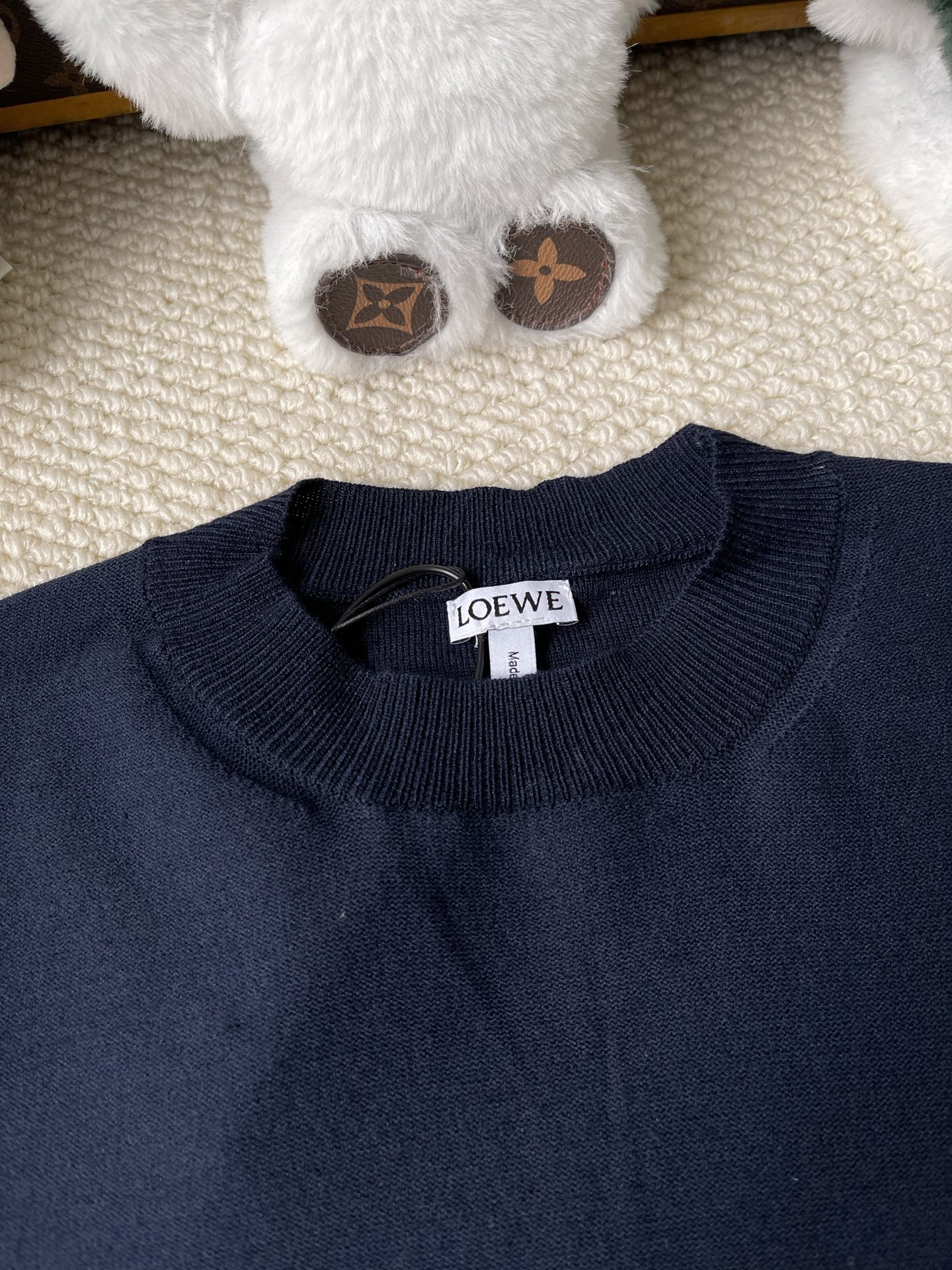 Chest-Emblem Knit Sweater — product photograph