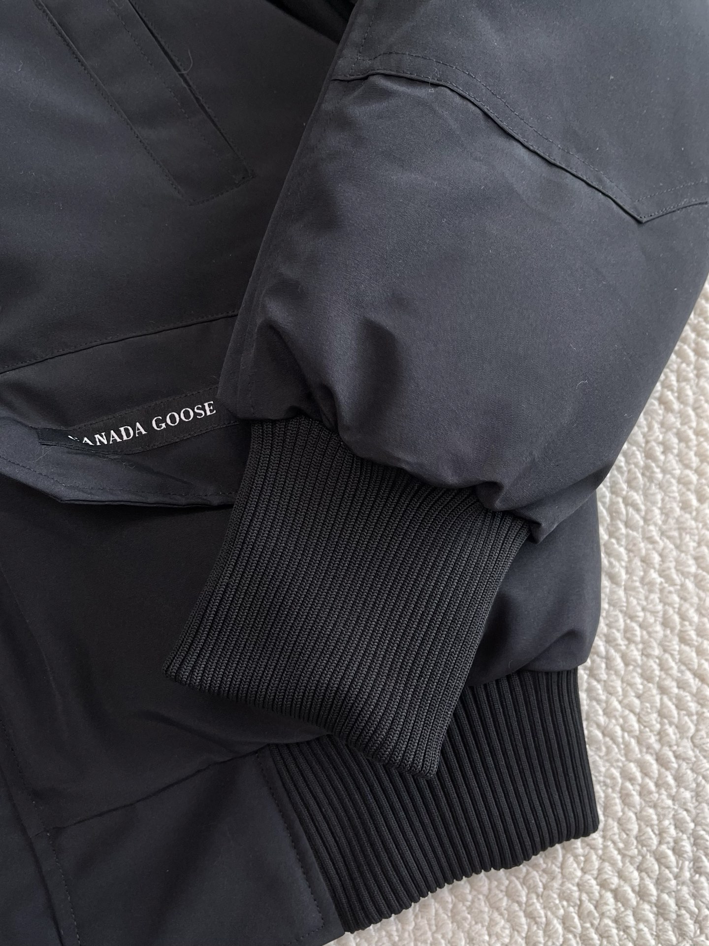 Trimmed-Hood Bomber Jacket — product photograph
