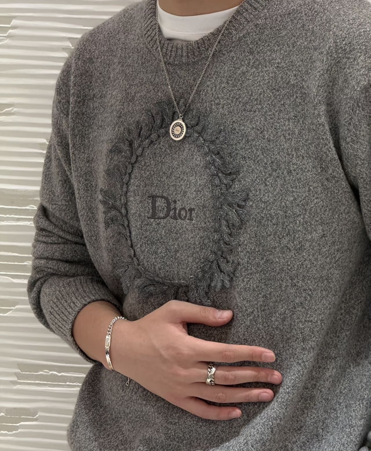 Wreath-Emblem Crewneck Sweater — product photograph