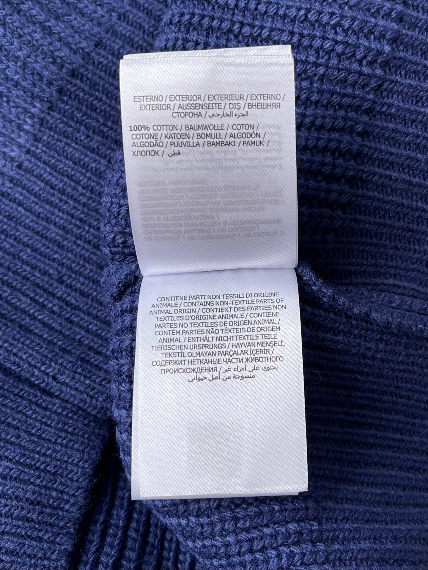 Ribbed Badge Quarter-Zip Sweater — product photograph