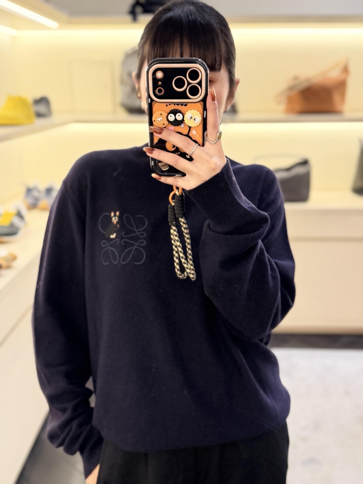 Chest-Emblem Knit Sweater — product photograph