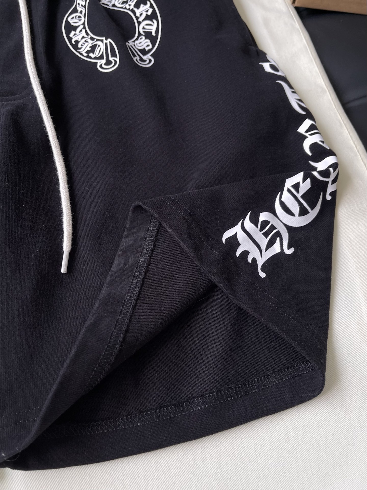 Horseshoe Crest Drawstring Shorts — product photograph
